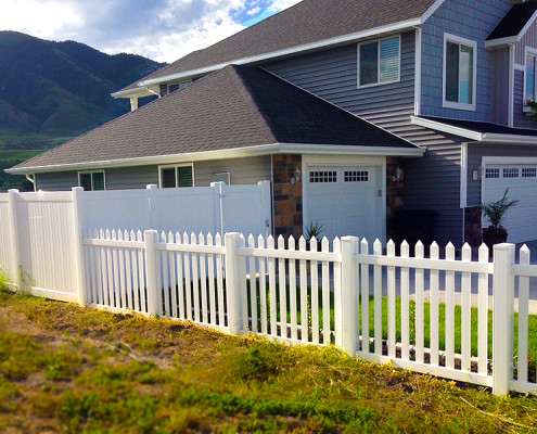 Picket Fence on edge of yard.