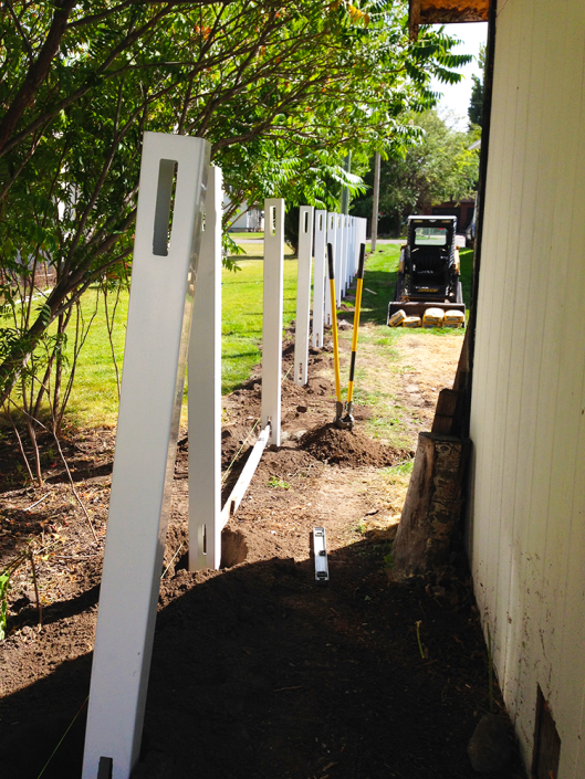 Vinyl privacy fence installation